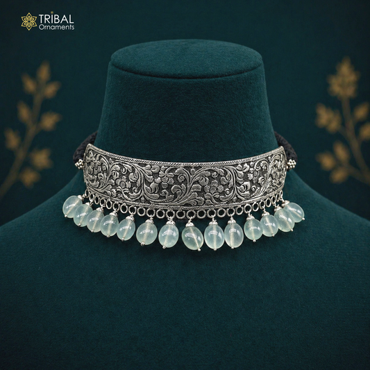 925 sterling silver Nakshi work charm necklace choker featuring tribal ethnic jewelry inspired by Rajasthan's rich cultural heritage.