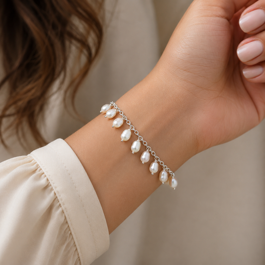 Unisex 925 sterling silver charm pearl bracelet with customizable charms, elegant jewelry by TRIBAL ORNAMENTS