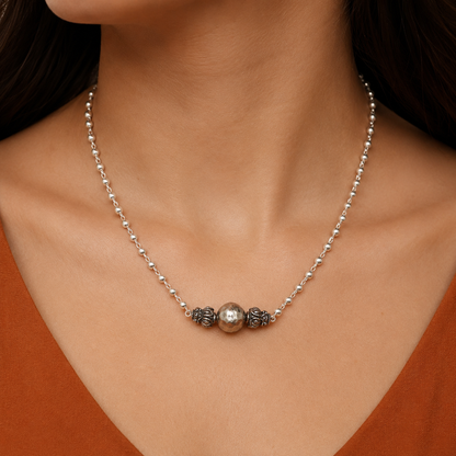 Sterling silver handmade 4mm bead necklace with a traditional ball pendant, featuring cultural jewelry design by TRIBAL ORNAMENTS