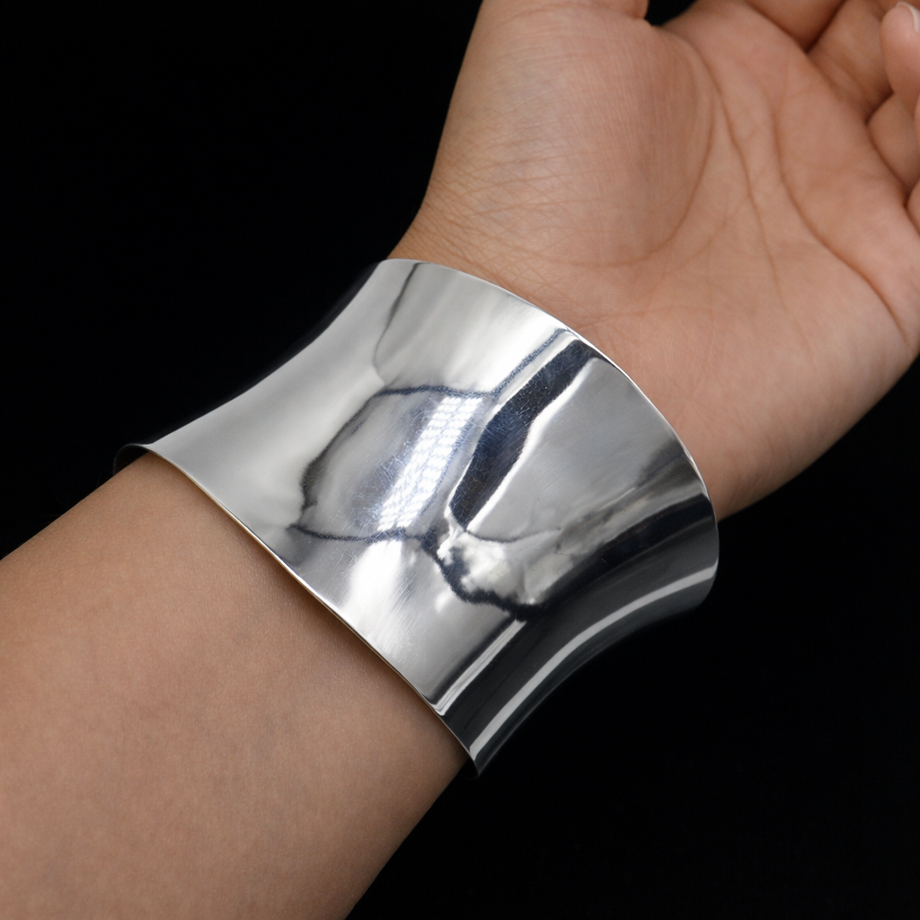 Bright shiny 925 sterling silver open face adjustable bangle bracelet with curved design, ideal for brides or special occasions.