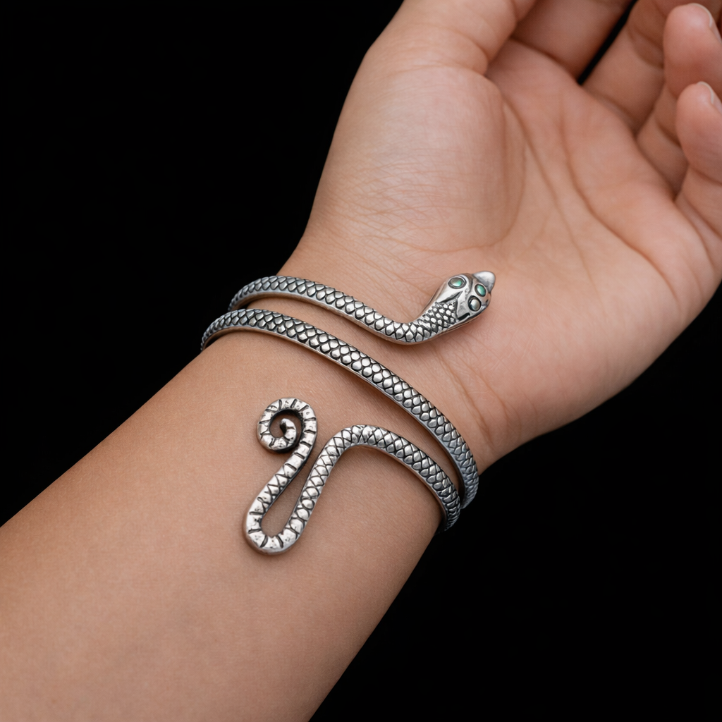 Sterling silver snake design armlet by TRIBAL ORNAMENTS, handmade cuff bracelet or ankle bangle with unique jewelry style.