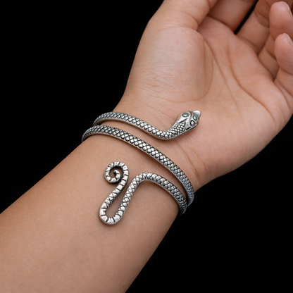 Sterling silver snake design armlet by TRIBAL ORNAMENTS, handmade cuff bracelet or ankle bangle with unique jewelry style.
