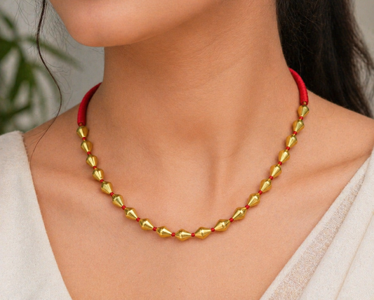 Sterling silver gold-polished dholki beaded necklace from TRIBAL ORNAMENTS, tribal jewelry set with intricate beadwork and traditional design