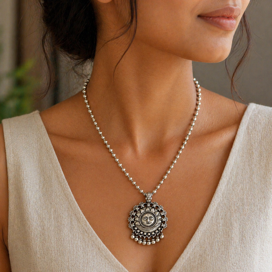 Sterling silver 30-inch beaded chain necklace with sun face pendant and hanging drops, handmade by TRIBAL ORNAMENTS.