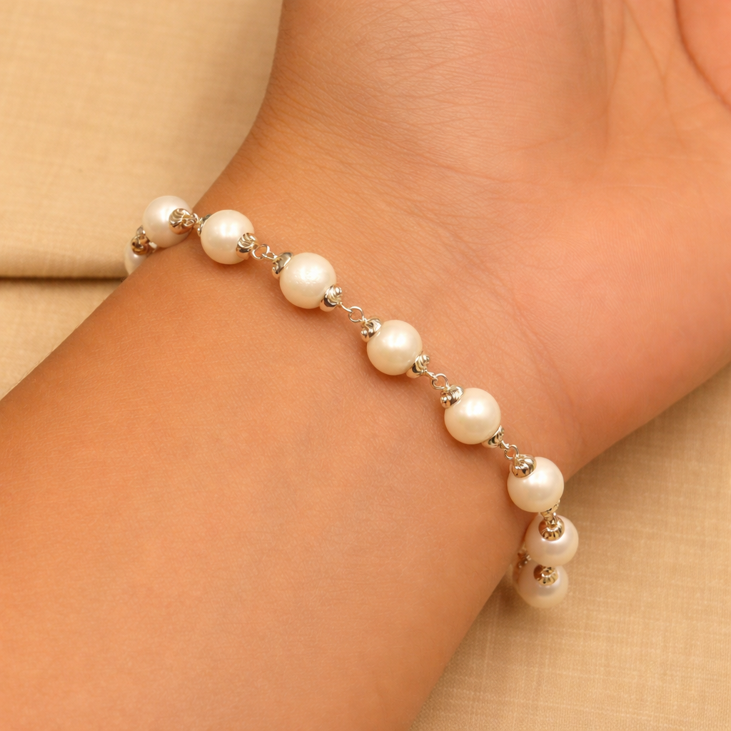 Unisex 925 sterling silver bracelet with pearl beads from TRIBAL ORNAMENTS, featuring elegant silver and pearl design.