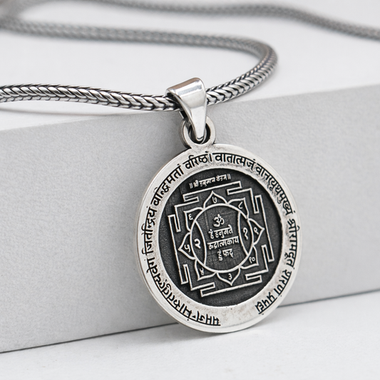 Sterling silver Lord Hanuman Yantra pendant with chain, handcrafted tribal jewelry featuring intricate design and detailed craftsmanship.