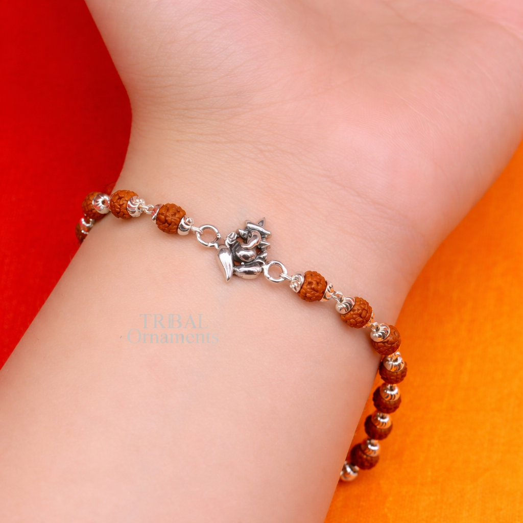 Sterling silver Lord Ganesha bracelet with Rudraksha and Tulsi beads, handcrafted by TRIBAL ORNAMENTS.