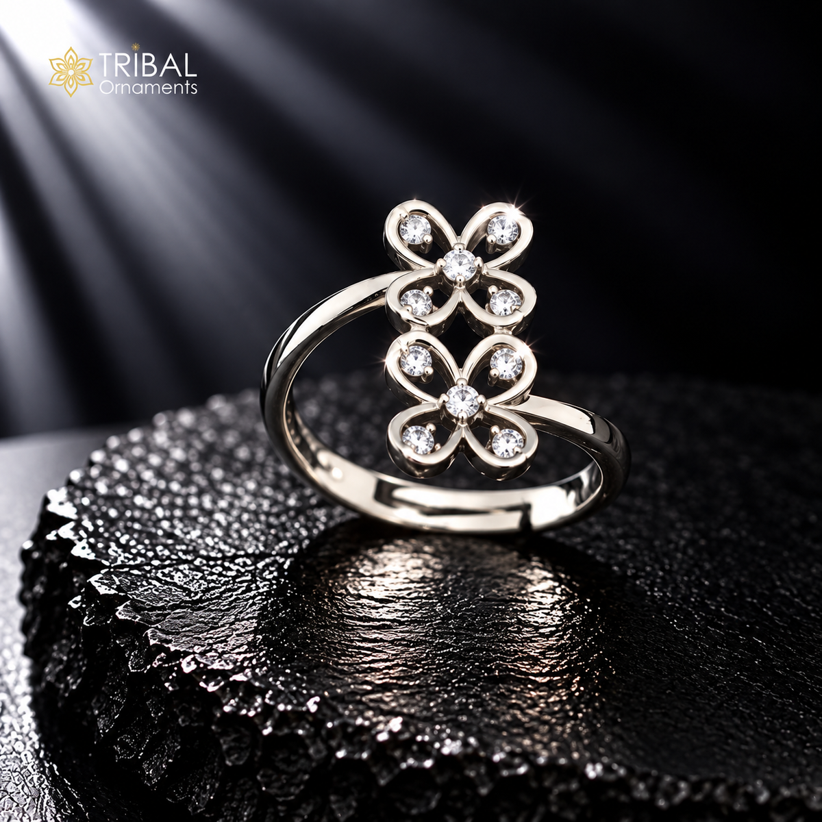Sterling silver flower-style CZ stone ring by TRIBAL ORNAMENTS, featuring intricate floral design and sparkling cubic zirconia accents.
