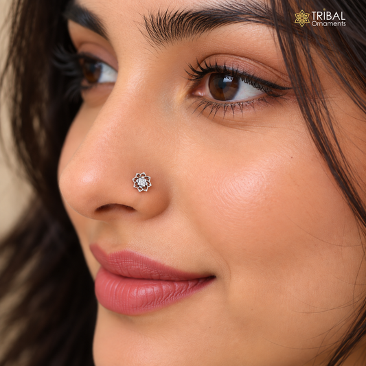 Sterling silver vintage flower-style nose pin with delicate lotus design, tribal jewelry accessory for ethnic nose piercing.