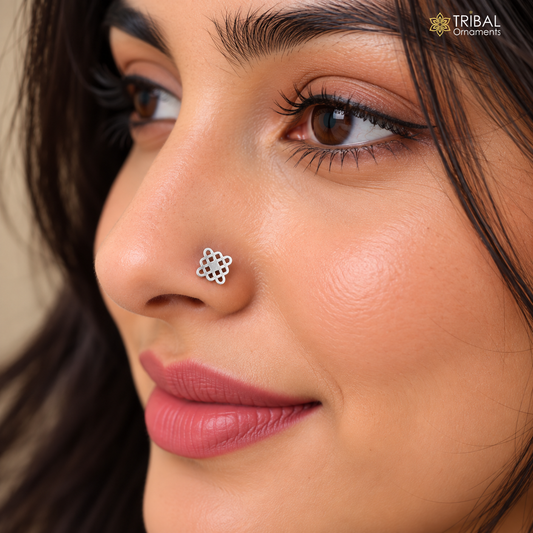 Elegant 925 sterling silver vintage nose pin with tribal design, showcasing intricate ethnic tribal jewelry style.