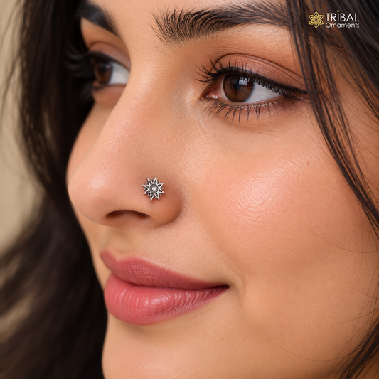 Elegant 925 sterling silver vintage star design nose pin with ethnic tribal style, featuring a starburst motif.