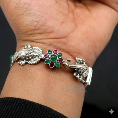 Sterling silver Ganesha bangle bracelet with floral red and green stones, ethnic jewelry by TRIBALORNAMENT.