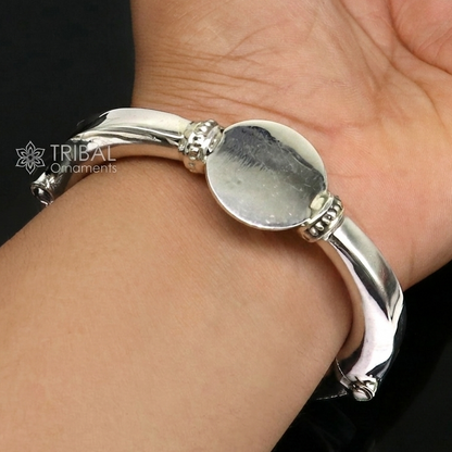 Sterling silver vintage bangle bracelet with plain design, handmade ethnic Banjara jewelry by TRIBAL ORNAMENTS, featuring a cuff style.
