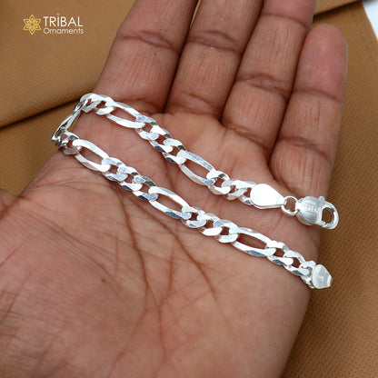 Sterling silver Figaro link chain bracelet with vintage design, unisex jewelry from Tribal Ornaments, shown in close-up image.
