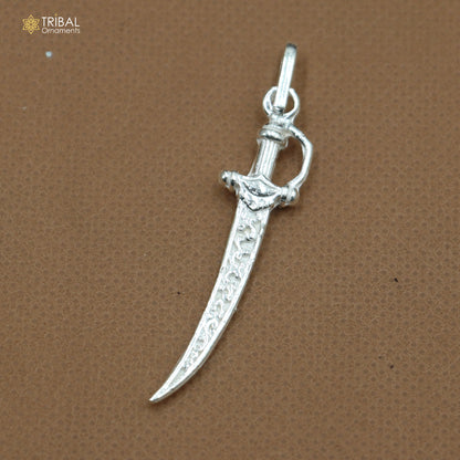 925 sterling silver small sword pendant, unisex dagger jewelry by TRIBAL ORNAMENTS, detailed blade and hilt design.