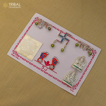 925 sterling silver Diwali pooja set with intricate designs, featuring traditional ornaments and accessories by TRIBAL ORNAMENTS.
