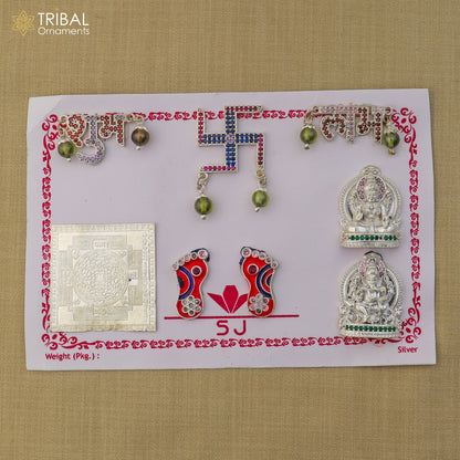 925 sterling silver Diwali pooja set with intricate tribal ornament design, including various ritual items for festive celebrations