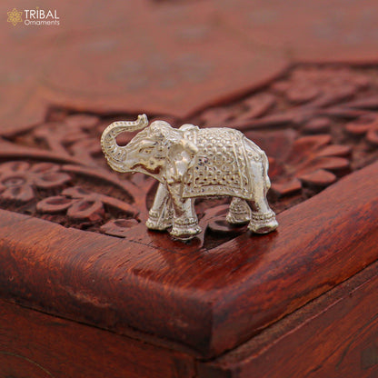 925 Sterling silver elephant sculpture figurine by TRIBAL ORNAMENTS, detailed puja art for wealth and prosperity.