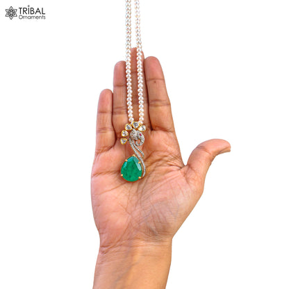 Sterling silver kundan work polki charm pendant with pearl necklace jewelry set by TRIBAL ORNAMENTS, featuring intricate traditional design.
