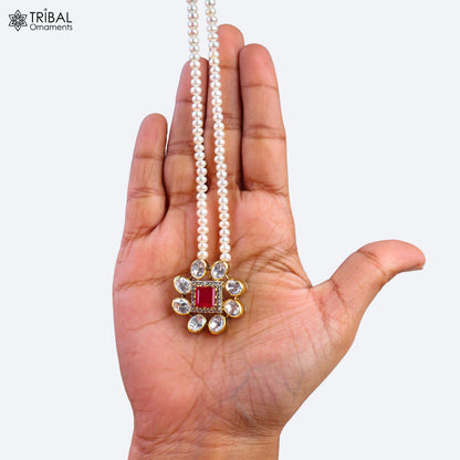 925 sterling silver kundan work polki charm pendant with pearl necklace jewelry set by TRIBAL ORNAMENTS, featuring intricate design and pearls.