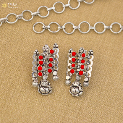 Sterling silver coral red stone traditional necklace and earrings set by TRIBAL ORNAMENTS, ethnic jewelry with intricate design.