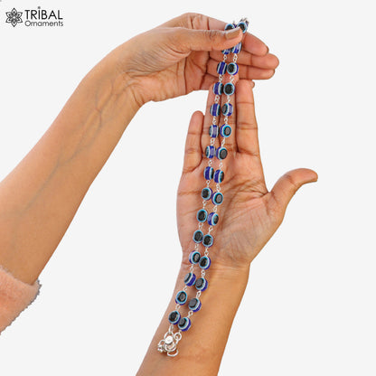Sterling silver evil eye ankle bracelet by TRIBAL ORNAMENTS featuring a 10.5-inch stylish foot jewelry design.