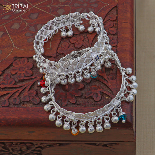 Sterling silver customized baby anklet with jingling charms, designed by TRIBAL ORNAMENTS, perfect for kids' ankle jewelry.