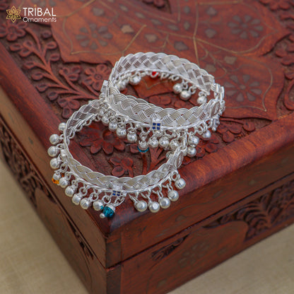 Sterling silver customized baby anklet with jingling charms, designed for kids, by TRIBAL ORNAMENTS.