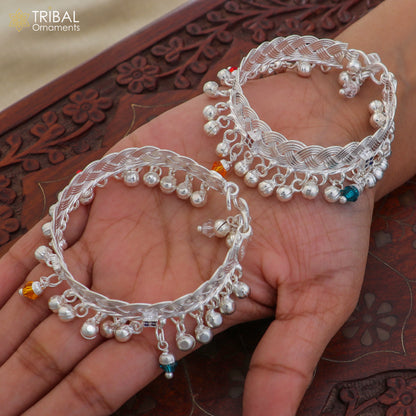 Sterling silver baby anklet with customizable design, featuring jingling bells, by TRIBAL ORNAMENTS, perfect for gifting.
