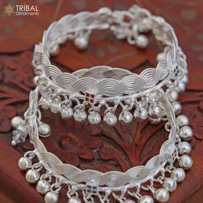 Sterling silver baby anklet by TRIBAL ORNAMENTS with jingling charms, customizable design, perfect for gifting to kids.