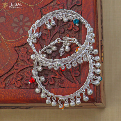 Sterling silver baby anklet by TRIBAL ORNAMENTS with customizable design, featuring jingling bells on a delicate ankle bracelet for kids.