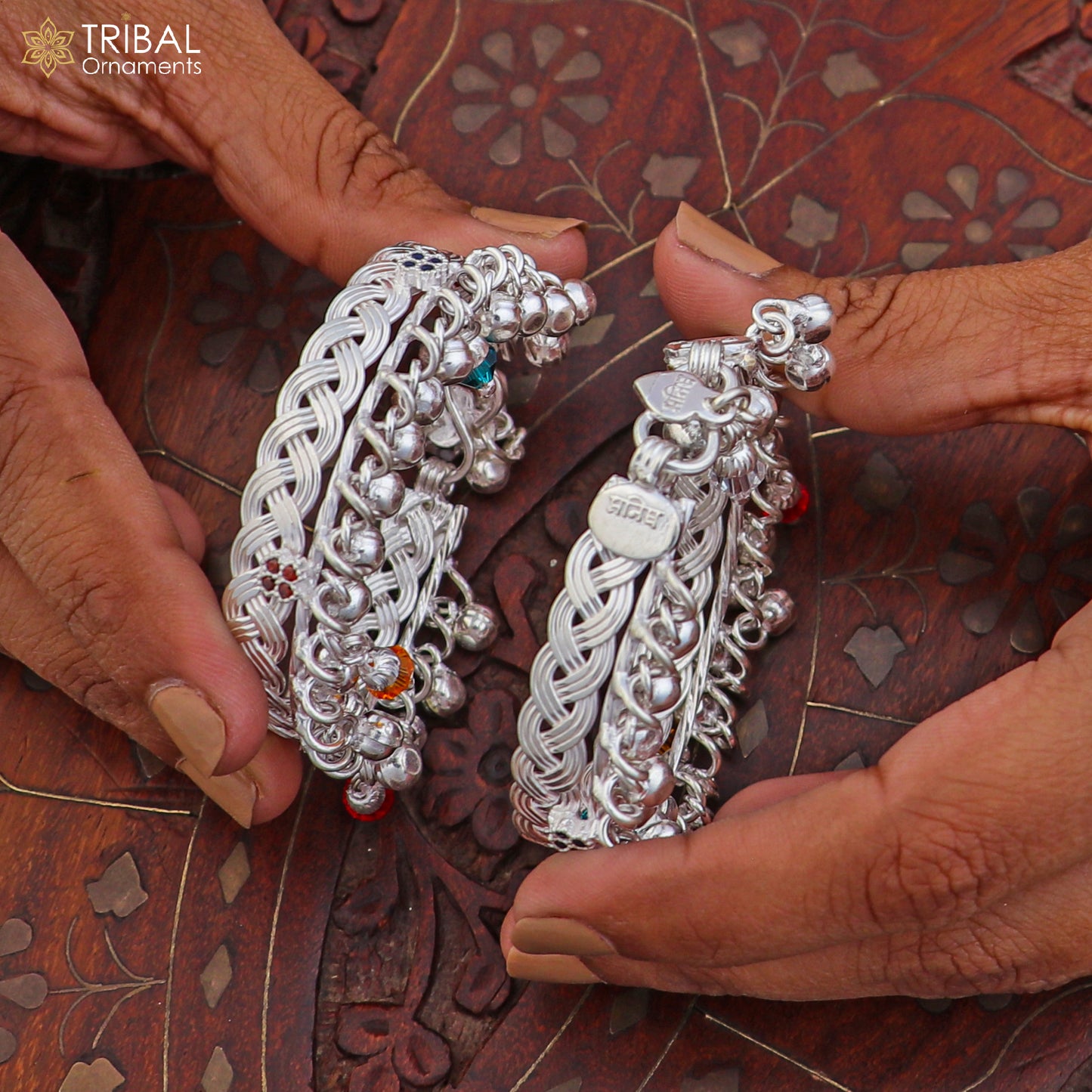 Sterling silver baby anklet with customizable design, featuring jingling bells and delicate craftsmanship by TRIBAL ORNAMENTS.