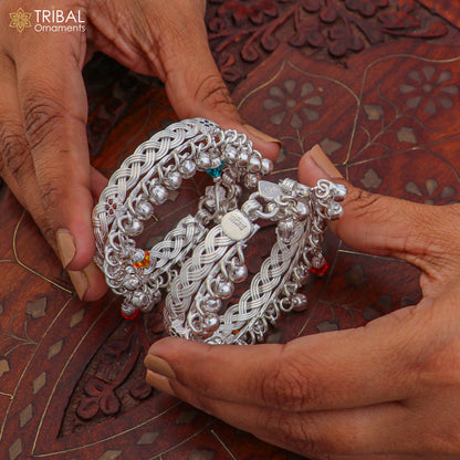 Sterling silver baby anklet with personalized design by TRIBAL ORNAMENTS, featuring jingling charms and adjustable chain for kids.