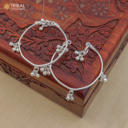Sterling silver baby anklet with personalized charms and jingling design from TRIBAL ORNAMENTS, perfect for gifting.