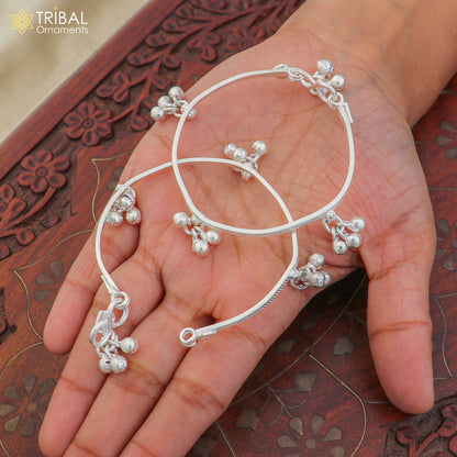 Sterling silver customized baby anklet with jingling charms, delicate and stylish kids' ankle bracelet from TRIBAL ORNAMENTS.