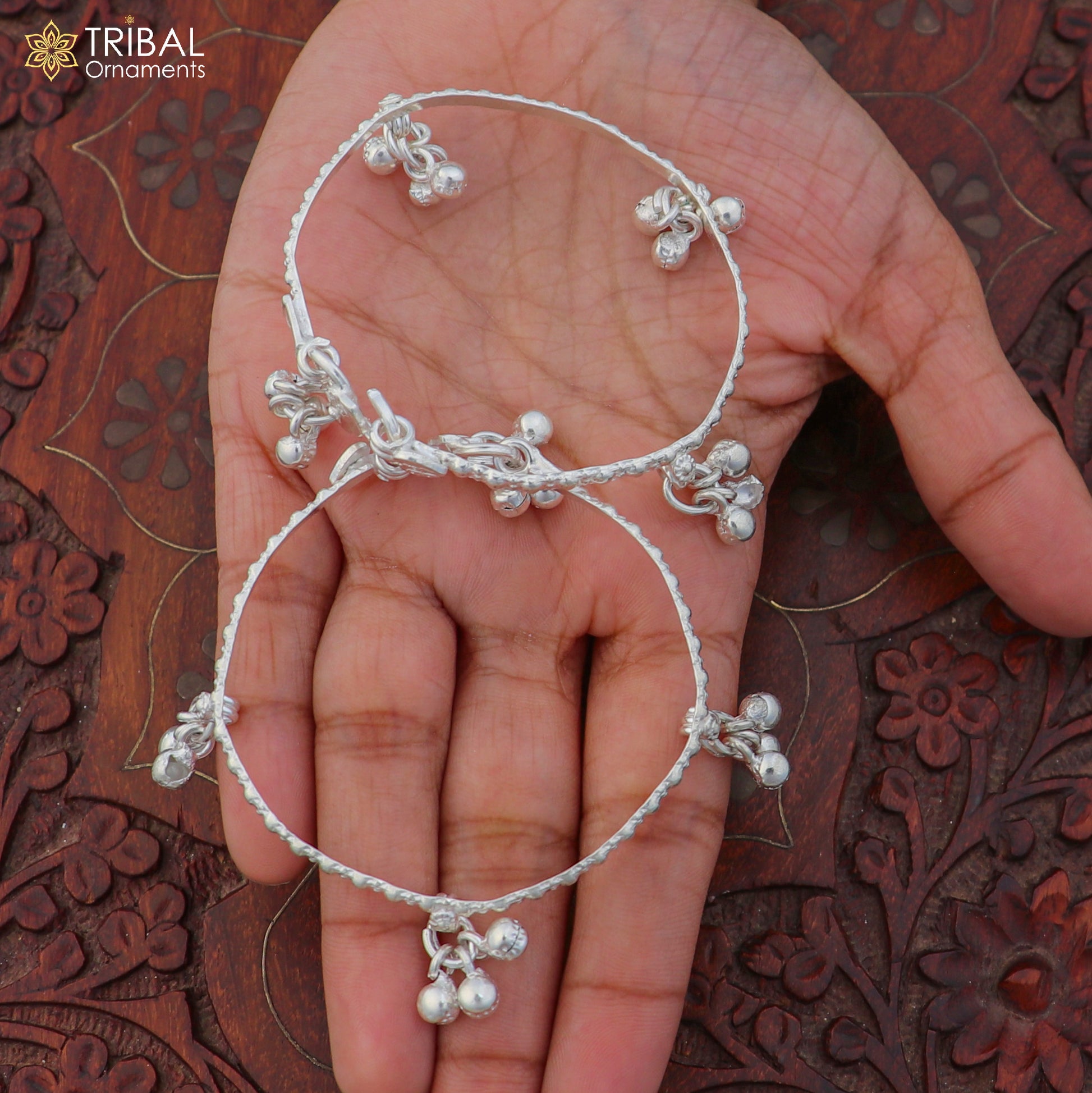 Sterling silver customized baby anklet with jingling charms, delicate children’s ankle bracelet by TRIBAL ORNAMENTS.