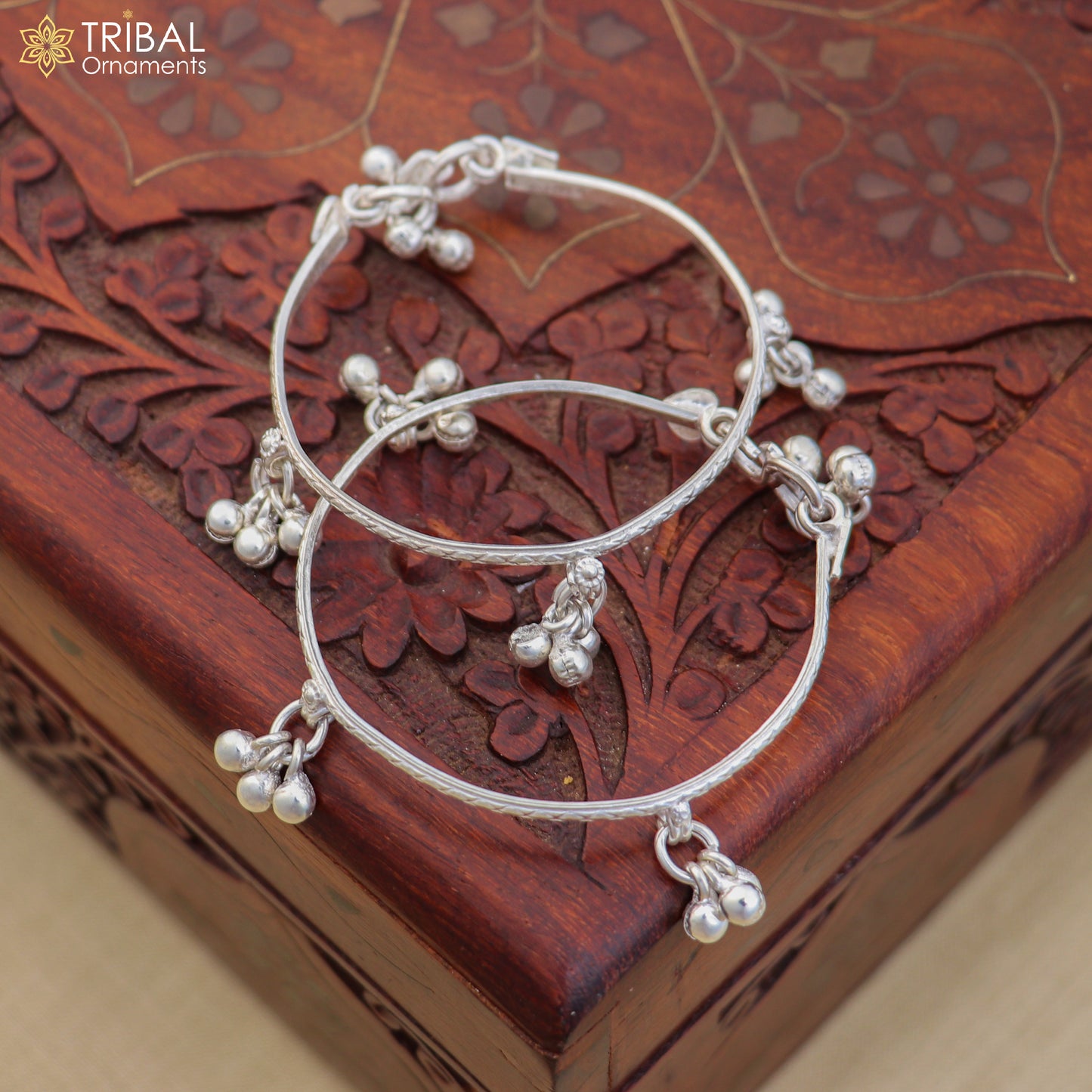 Sterling silver baby anklet by TRIBAL ORNAMENTS, customizable kids ankle bracelet with jingling design and delicate charm.