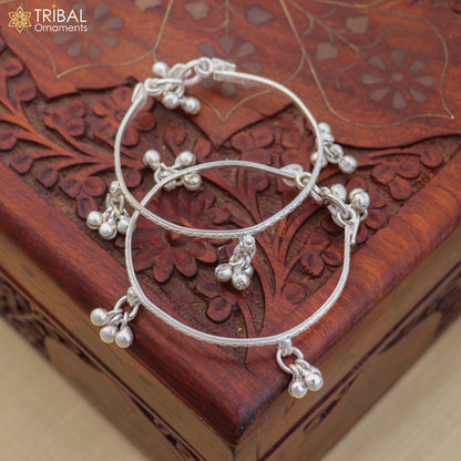 Sterling silver baby anklet by TRIBAL ORNAMENTS, customizable kids ankle bracelet with jingling design and delicate charm.