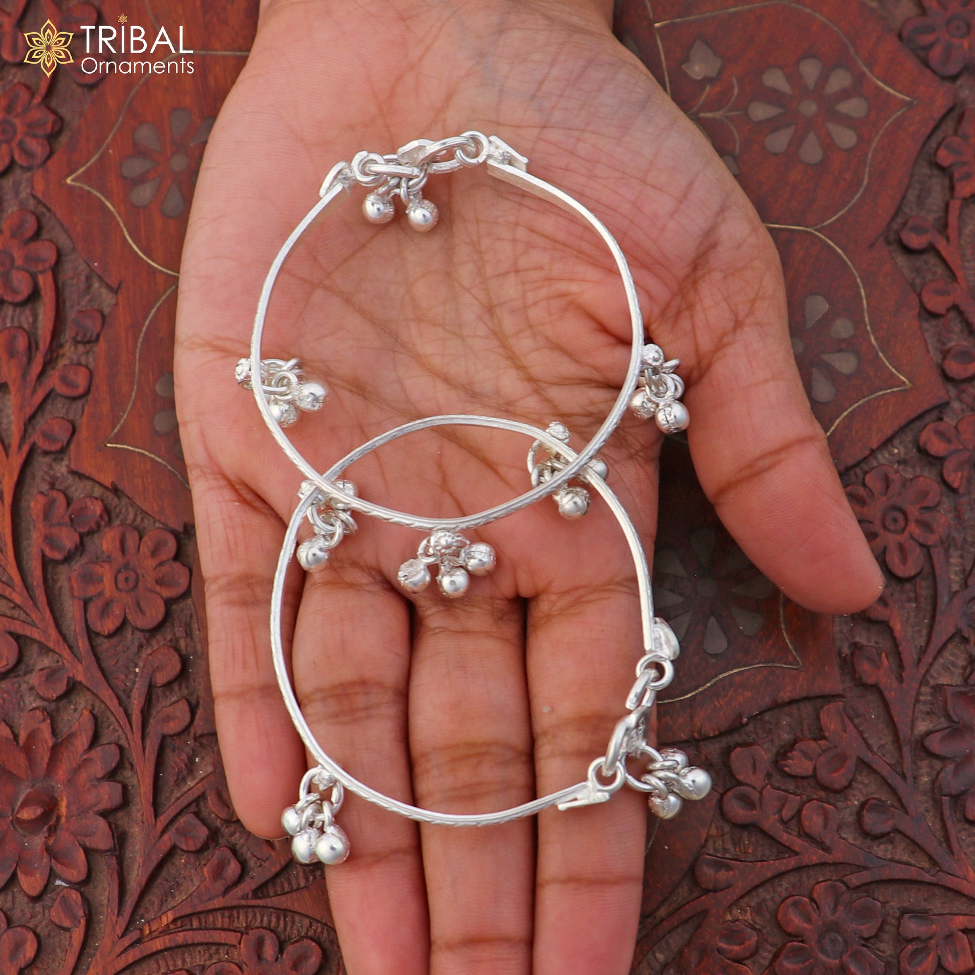 Sterling silver customized baby anklet with jingling charms, designed for kids, from TRIBAL ORNAMENTS.