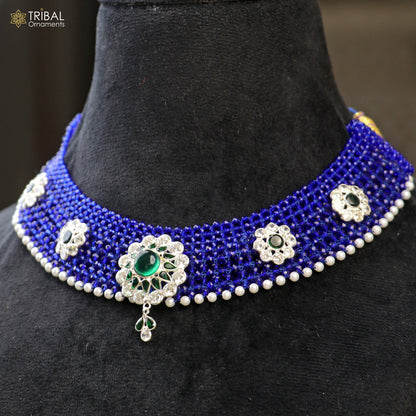 Silver blue Indian traditional choker necklace set with cultural design from TRIBAL ORNAMENTS, featuring intricate jewelry details.