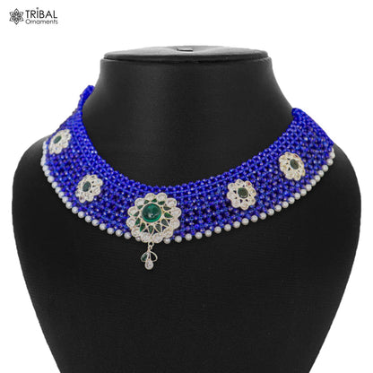 Indian traditional silver blue choker necklace set with intricate cultural design from TRIBAL ORNAMENTS, featuring detailed jewelry elements.