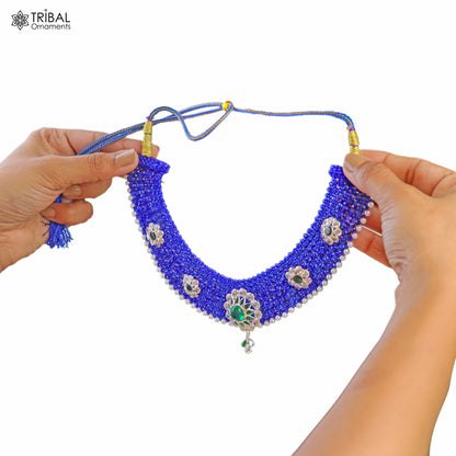 Indian traditional silver blue choker necklace set with intricate cultural design from TRIBAL ORNAMENTS, showcasing detailed craftsmanship.
