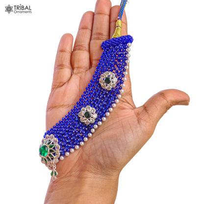 Silver blue Indian traditional choker necklace set with intricate cultural design from TRIBAL ORNAMENTS, displayed on a white background.