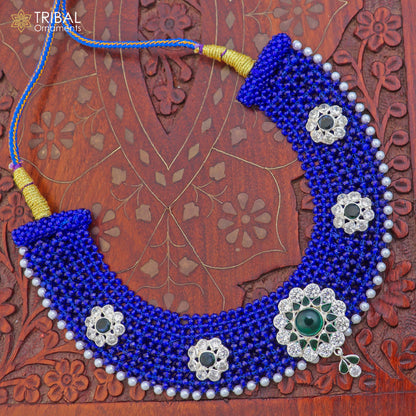 Silver blue Indian traditional choker necklace set with intricate cultural design by TRIBAL ORNAMENTS, displayed on a neutral background.