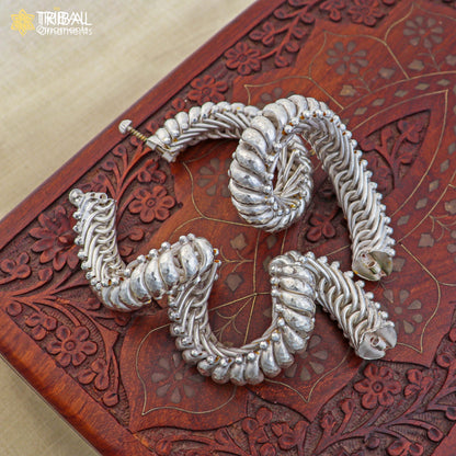 Sterling silver vintage spiral sutli design bangle or kada by Tribal Ornaments, showcasing intricate handcrafted jewelry.