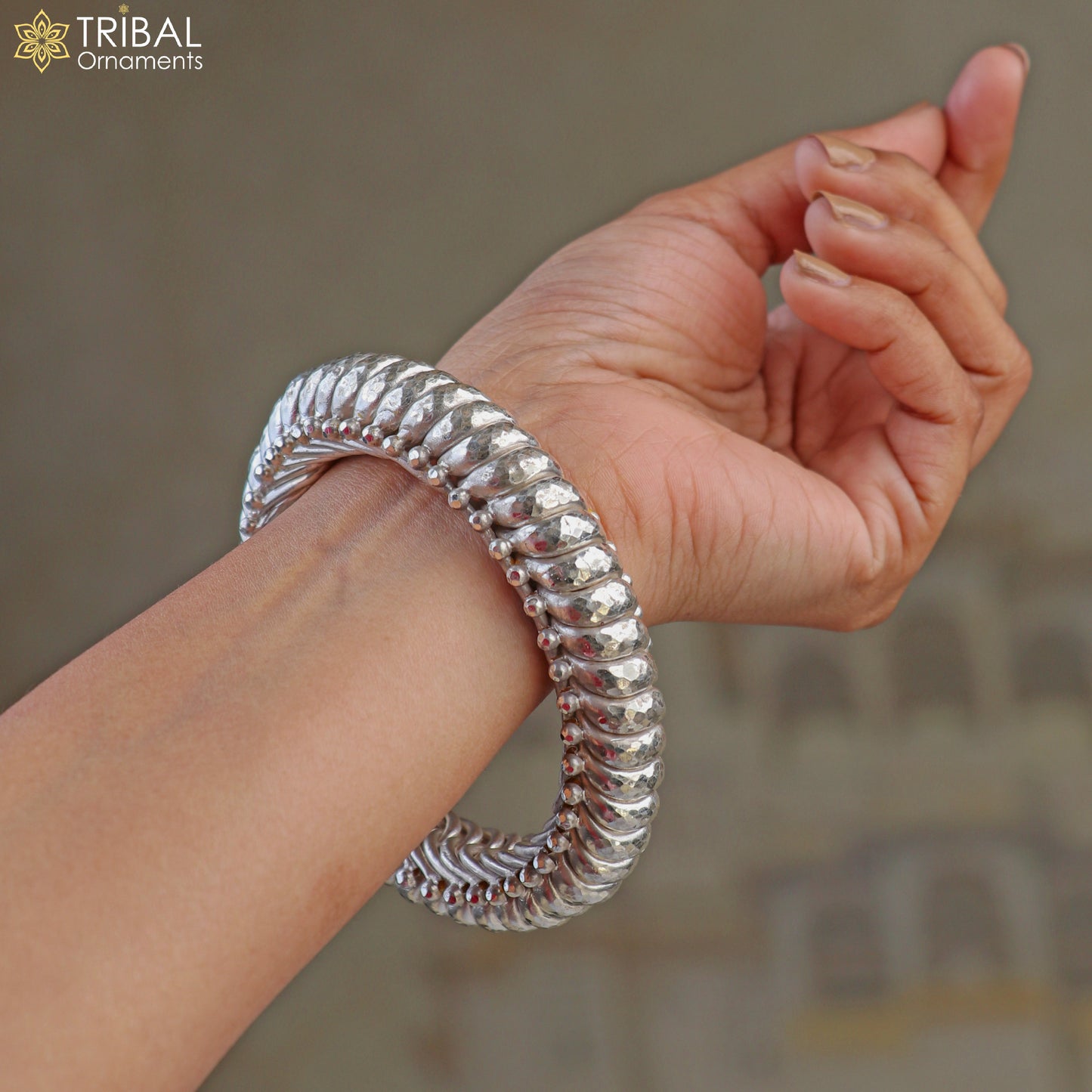 Sterling silver vintage spiral sutli design bangle by TRIBAL ORNAMENTS, showcasing intricate craftsmanship and customizable jewelry features.