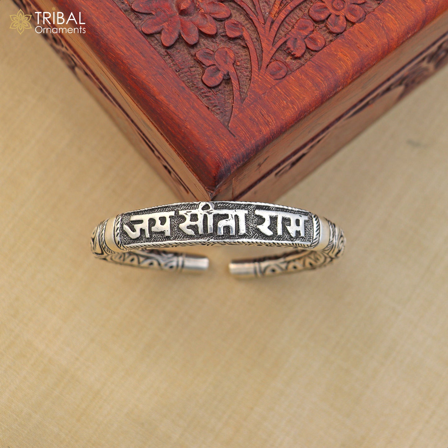 Sterling silver Ram mantra bracelet with tribal chitai work, unisex ethnic jewelry featuring "Jai Sita Ram" inscription.