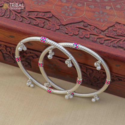 Sterling silver vintage ankle bracelet with jingling charms, custom design by TRIBAL ORNAMENTS, featuring intricate jewelry details.
