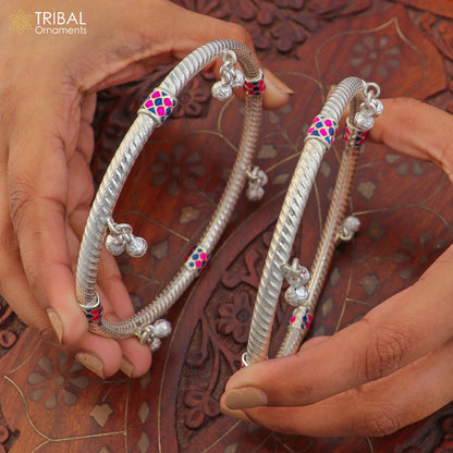 Sterling silver vintage ankle bracelet with jingling charms, custom design from TRIBAL ORNAMENTS, featuring intricate jewelry details.
