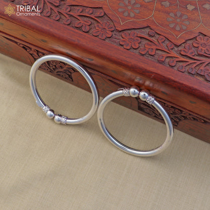 Sterling silver custom ball design bangle bracelet by TRIBAL ORNAMENTS, featuring stylish tribal jewelry with intricate details.